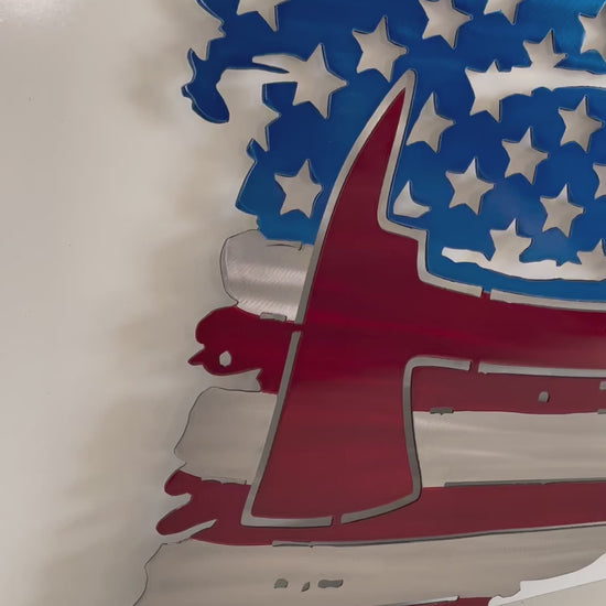 Tattered metal American flag with a fireman's axe. Thin Red Line